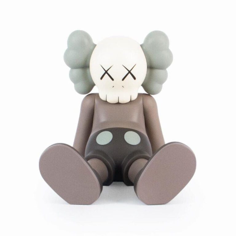 Sitting Kaws Figures - Closet Spain